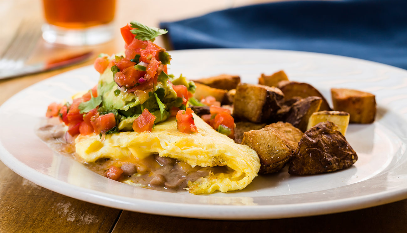 Cali omelette - pinto beans, cheddar, avocado, pico de gallo.